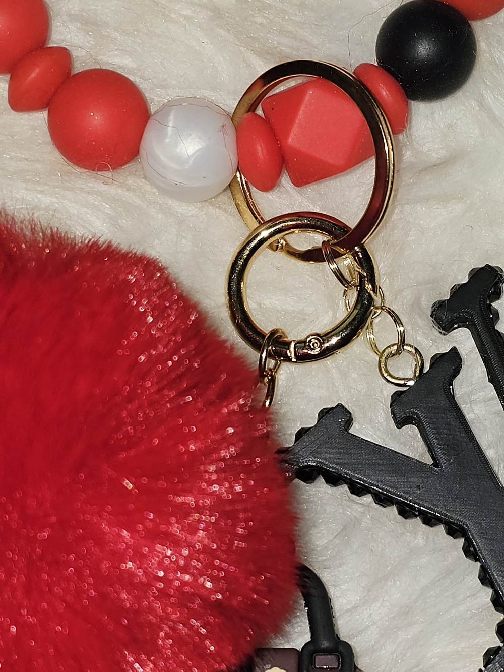 LV Wristlette. Detachable Emblem, Purse, Pom Pom And Stretchable Wristlette - Picture 3 of 8